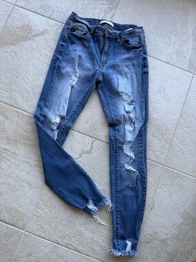 Women’s Distressed Blue Skinny Jeans